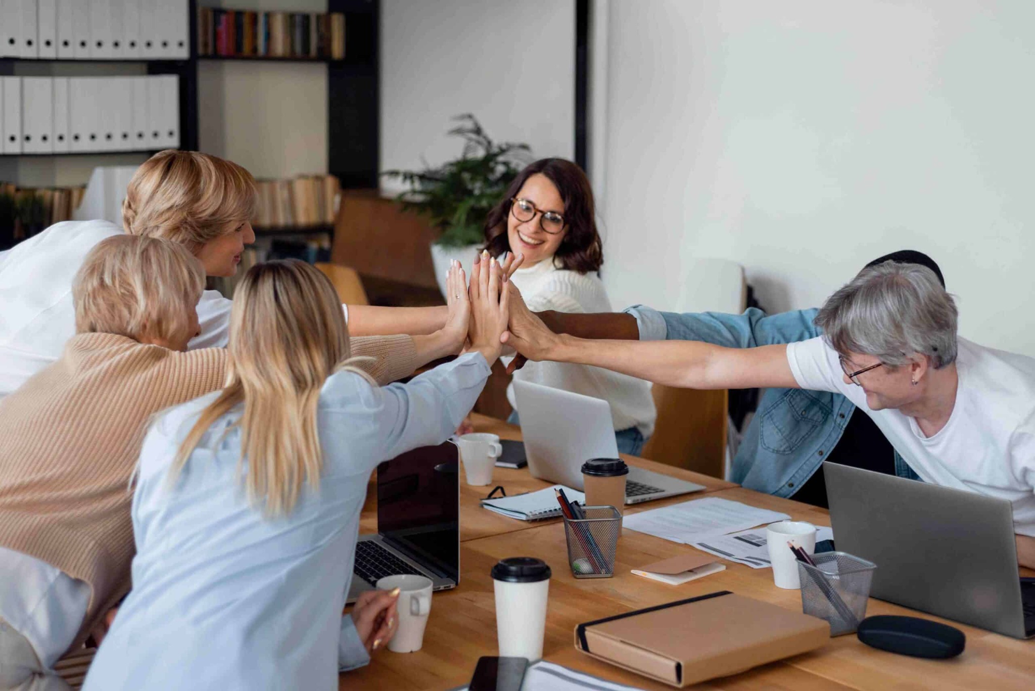 Technology professionals collaborating in a modern office